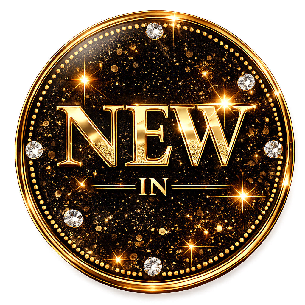 New in sign featuring sparkling gold letters, highlighting the latest fashion arrivals.