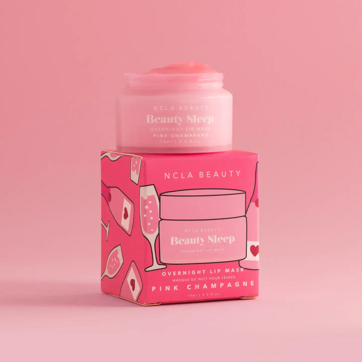 Beauty Sleep Overnight Lip Mask in Pink Champagne packaging and jar for overnight lip mask nourishment.