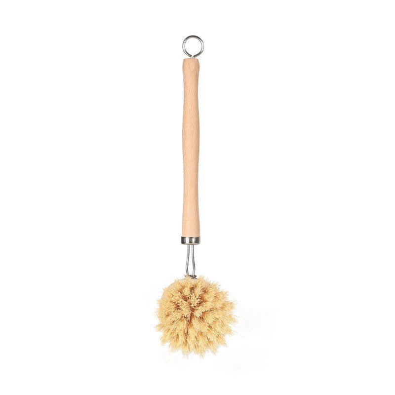 Duster with a wooden handle and fluffy head on a white background