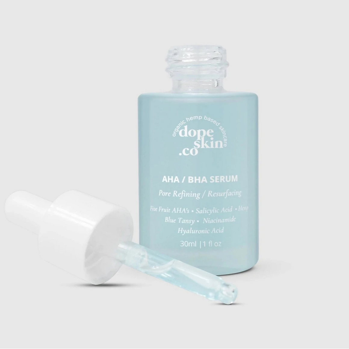 Dope Skin & Co. AHA/BHA serum bottle with applicator on a white background