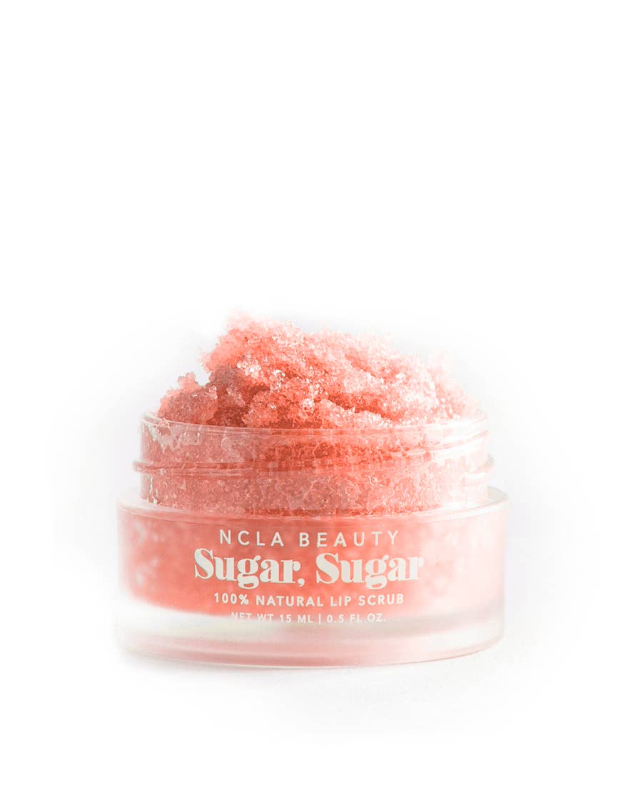 NCLA Beauty Sugar Sugar lip scrub in a clear container on a white background