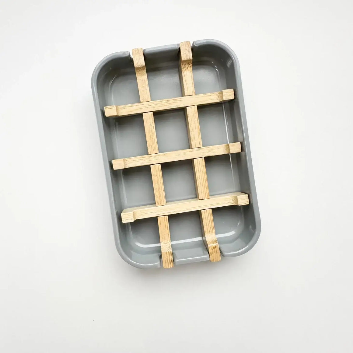 Gray rectangular tray with a wooden lattice on a white background