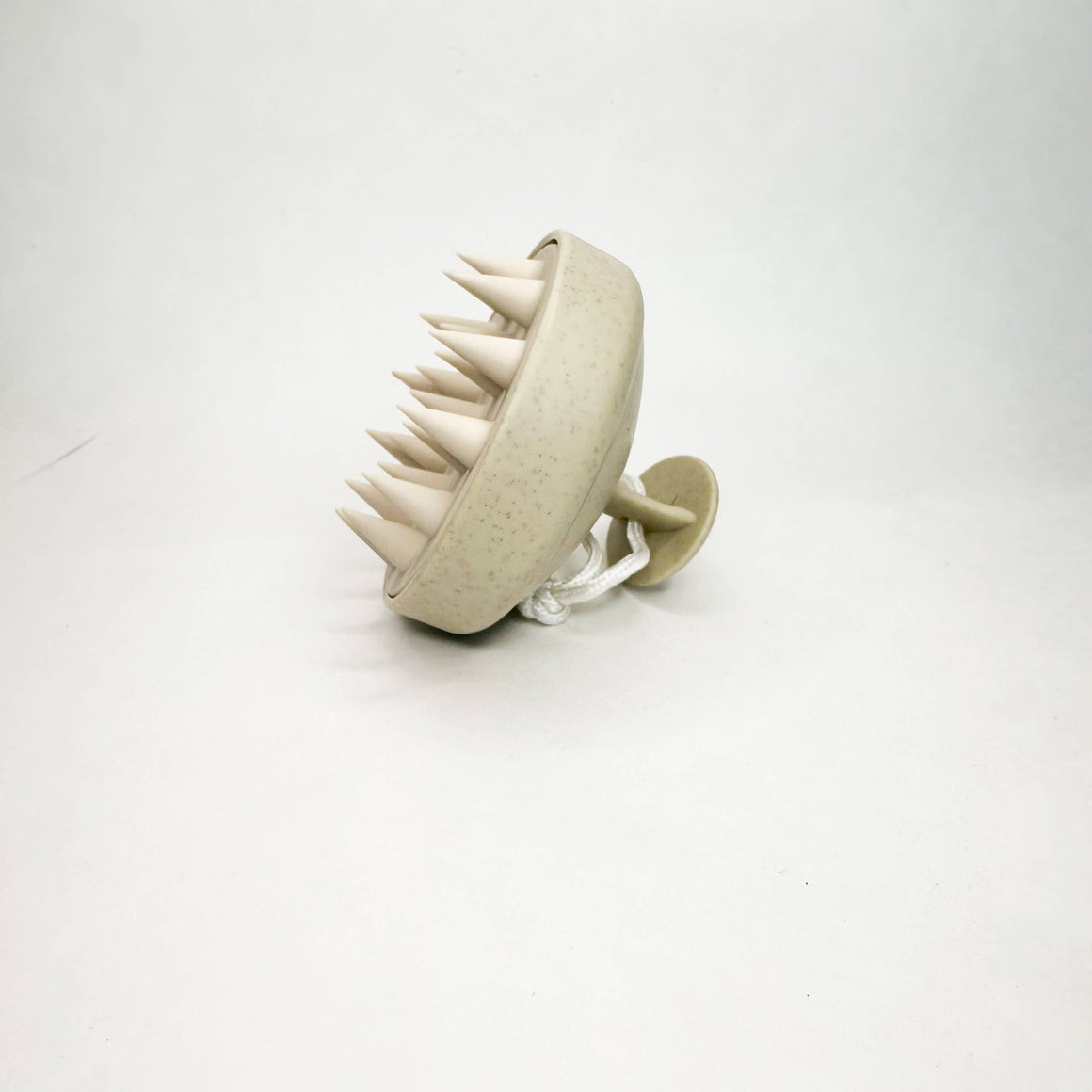 Beige spiked ball on a white background