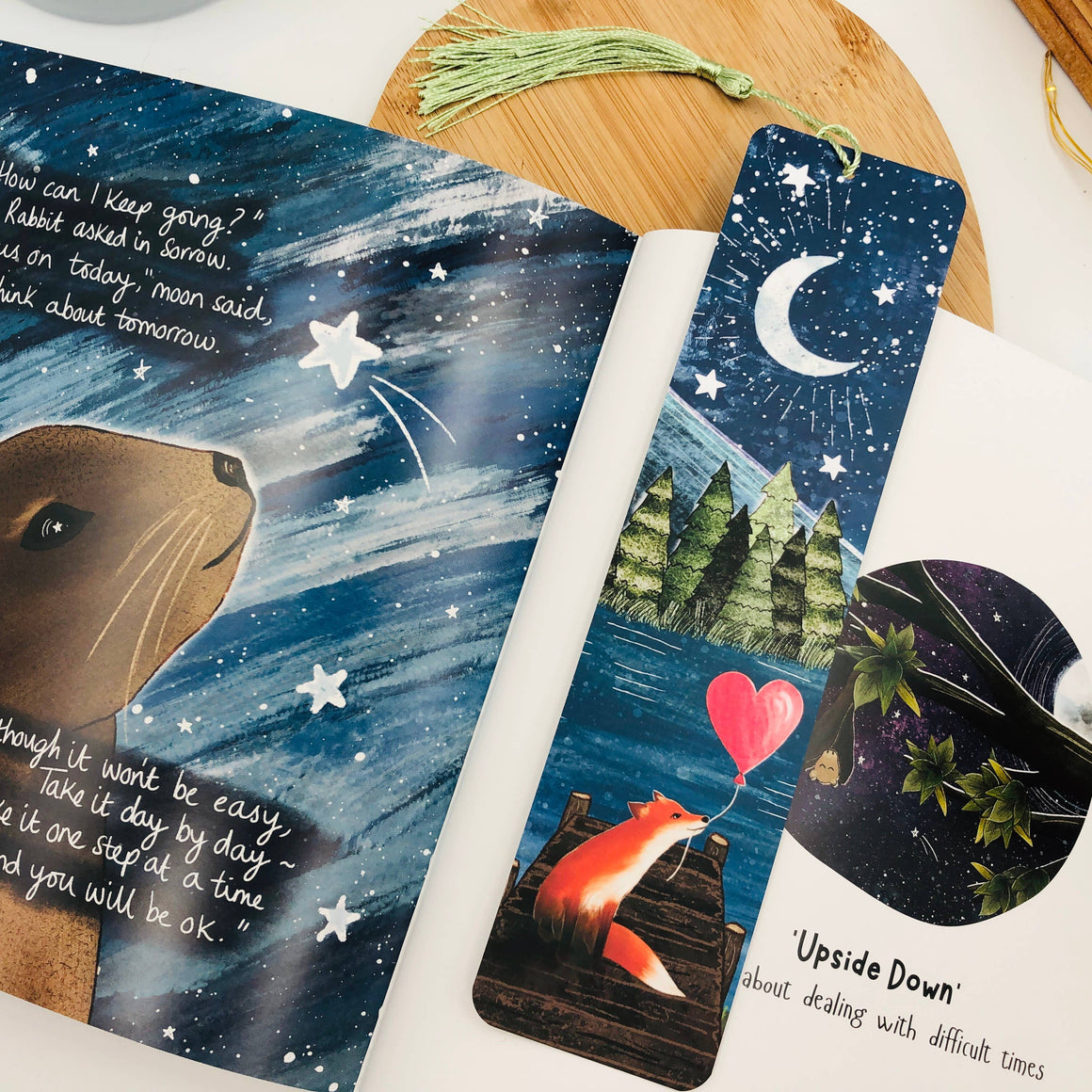 Bookmarks with illustrations of a bear and a fox, set against a night sky with stars and a crescent moon.