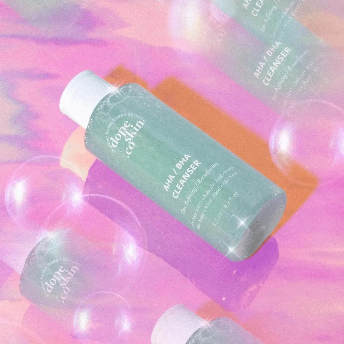 Skincare bottle labeled 'dope & co' on a colorful, abstract background with bubbles.