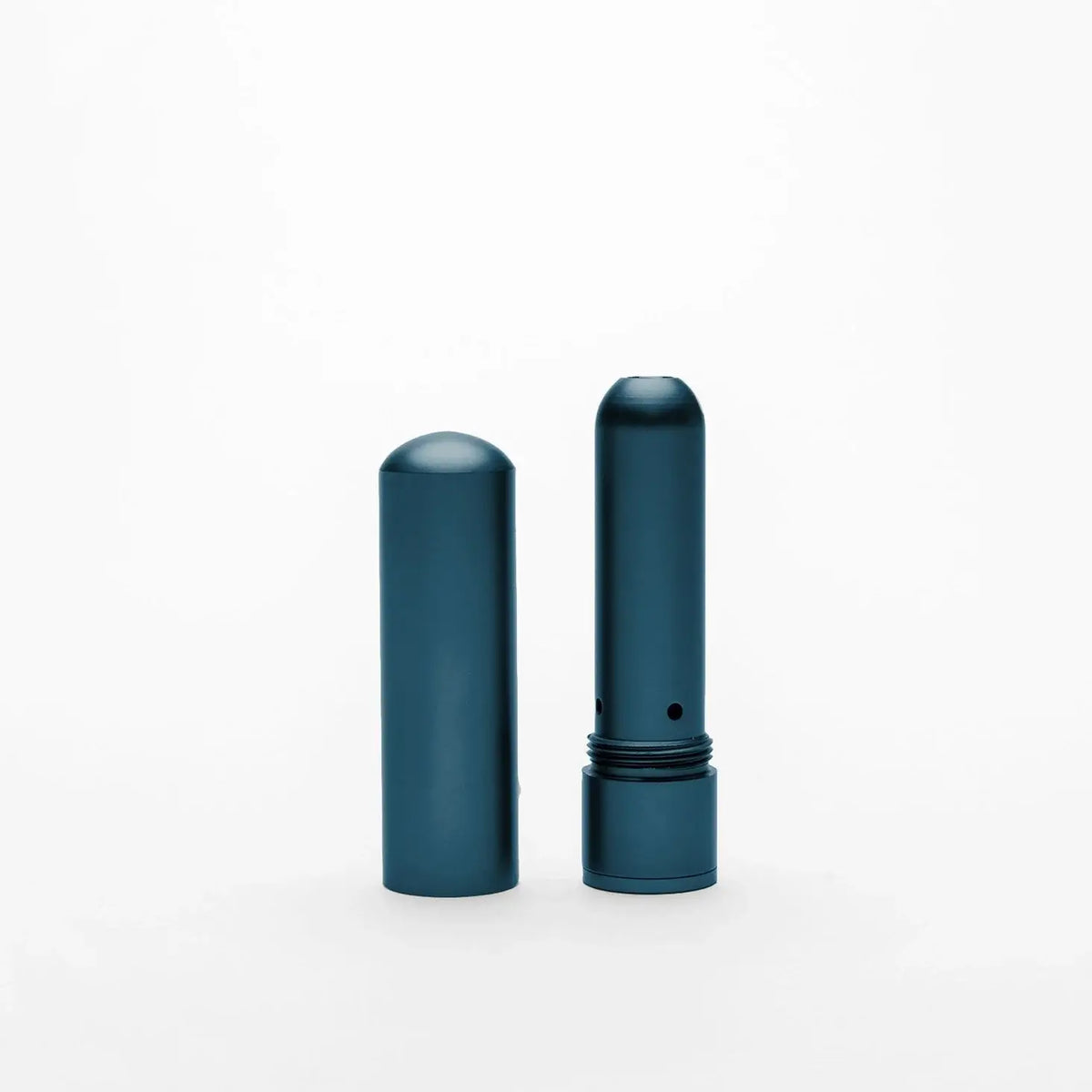 Two blue cylindrical objects on a white background