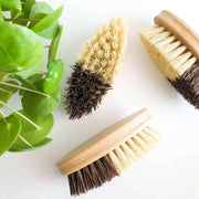 Bamboo Vegetable Brush - Smile Boutiques, sustainable and versatile kitchen cleaning brushes with dual bristles.