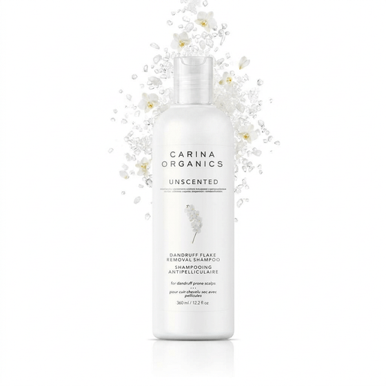Carina Organics shampoo bottle with floral elements on a white background