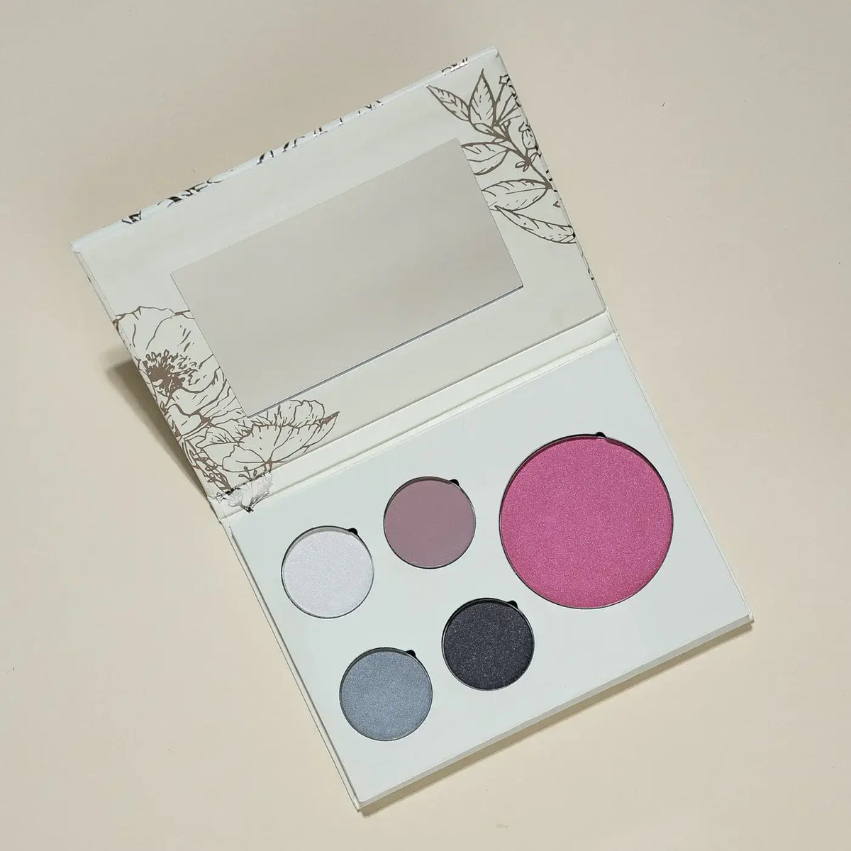 Makeup Seasonal Palette with four colors on a beige background