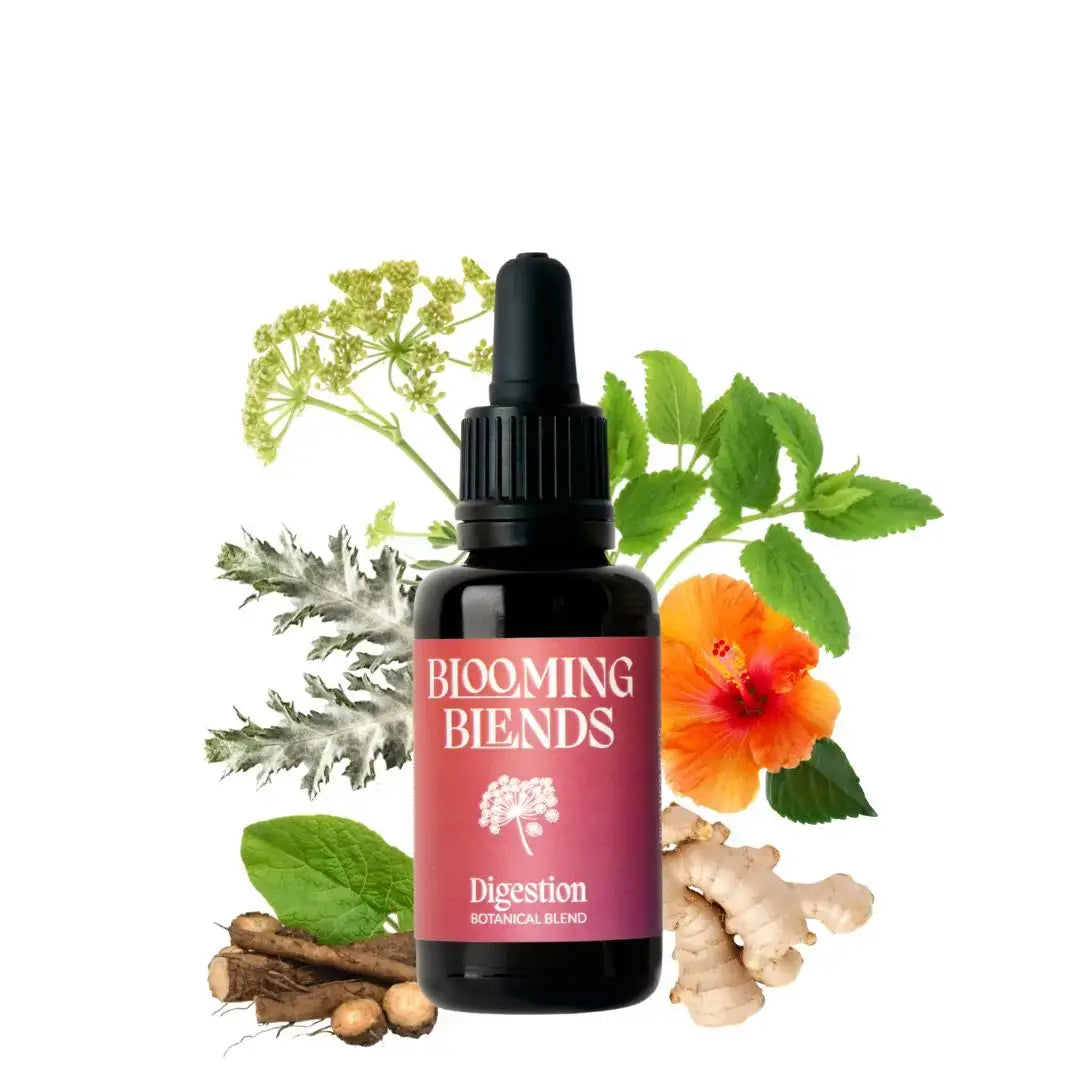 Bottle of Blooming Blends Digestion Botanical Blend with herbs and flowers on a white background