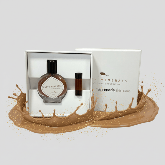 Two small bottles with labels on a white background, surrounded by a brown liquid splash.