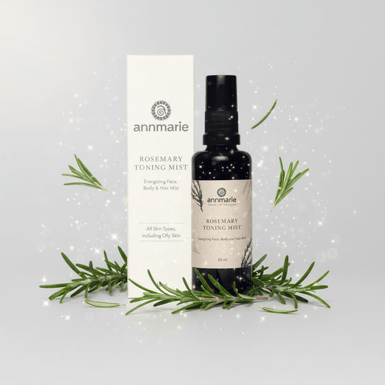 Annmarie Rosemary Toning Mist bottle and packaging with rosemary leaves on a light gray background