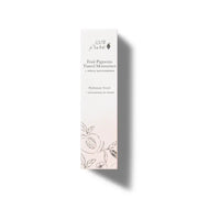 Product packaging with floral design on a white background