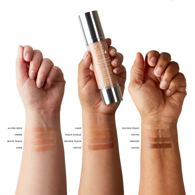 Swatches of Fruit Pigmented® Tinted Moisturizer - 100% Pure 50 ml shades on arms.