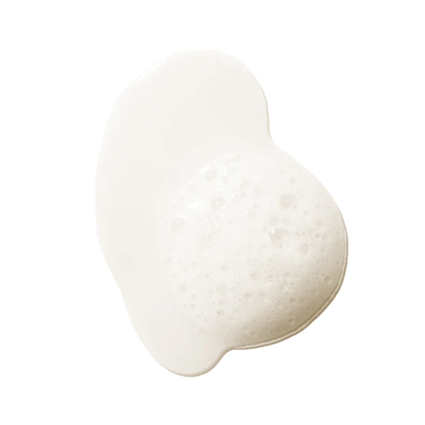 Repair Shampoo foamy texture showcasing its cleansing properties for restoring damaged hair.