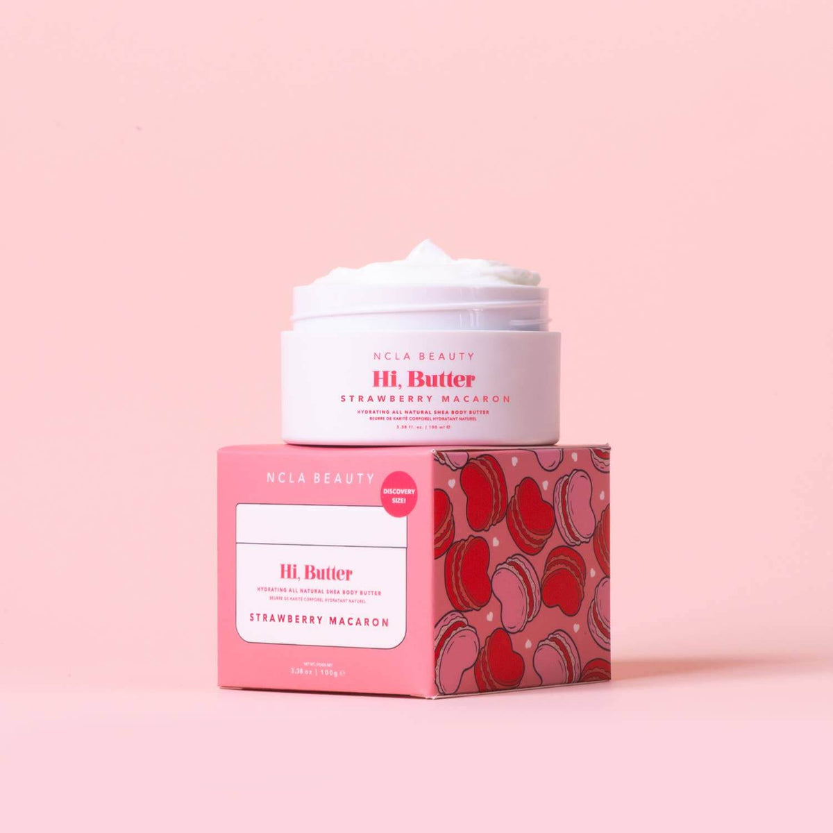 UCLA Beauty H.I. Butter Strawberry Macaron with packaging on a pink background
