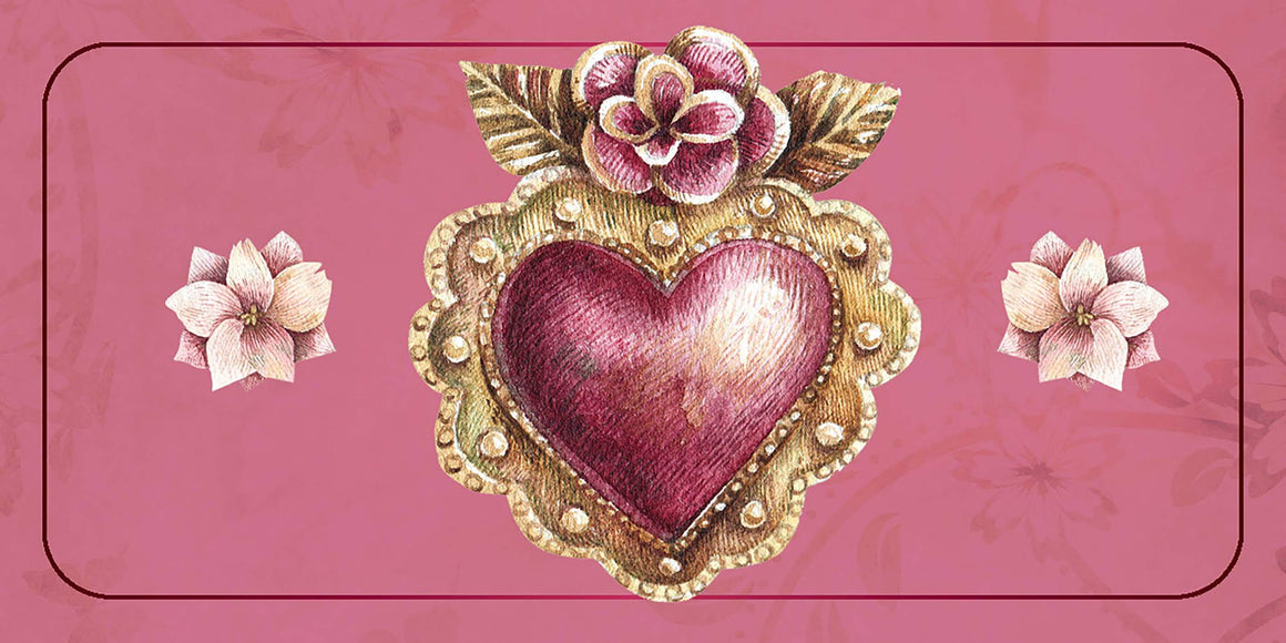 Decorative heart emblem with gold detailing and flowers on a pink background