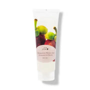 Mangosteen Shower Gel 100 Pure in a tube surrounded by fresh mangosteen fruits