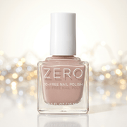 Nail polish bottle labeled 'ZERO' with a soft focus background