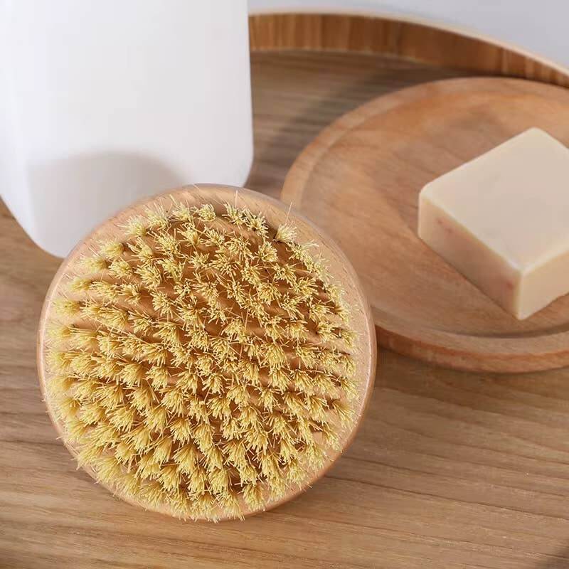 Sisal Bristle Body Brush - Smile Boutiques on a wooden tray, ideal for effective dry brushing and daily exfoliation.