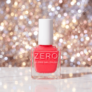 Pink nail polish bottle labeled 'ZERO' against a sparkling background