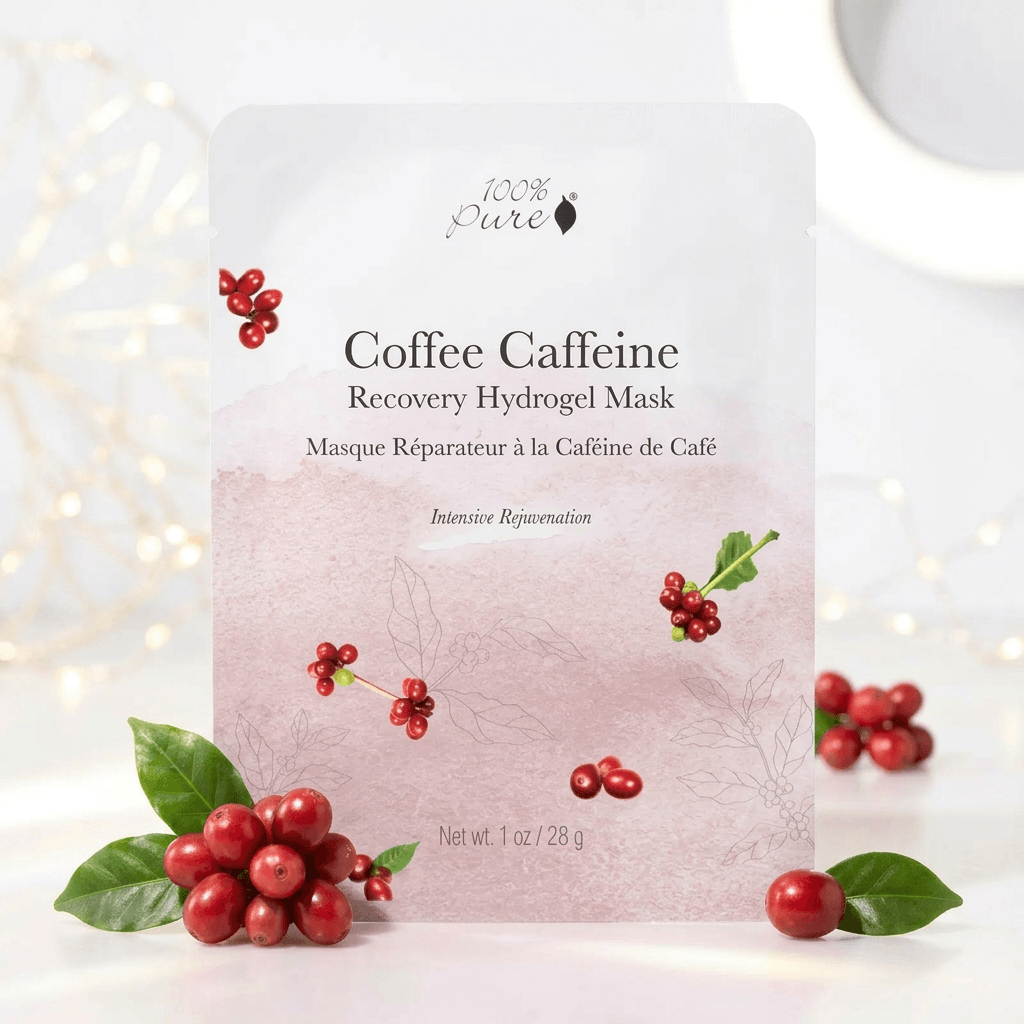 Coffee Caffeine Recovery Hydrogel Mask packaging with coffee beans and leaves on a light background