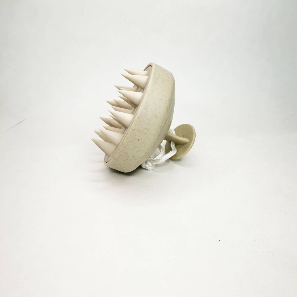 Beige spiked ball on a white background