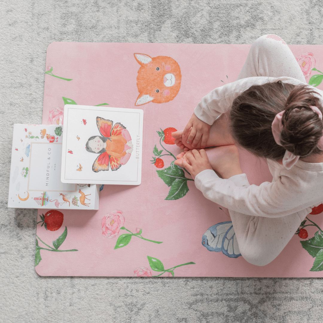 Sweet Print Kids Yoga Mat featuring charming animal and butterfly illustrations with a child practicing yoga.