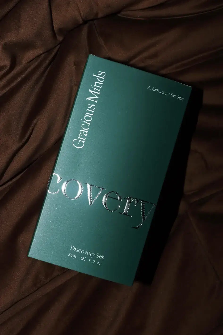 image of The Discovery AM - PM Radiance Set packaging from Gracious Minds on a brown surface
