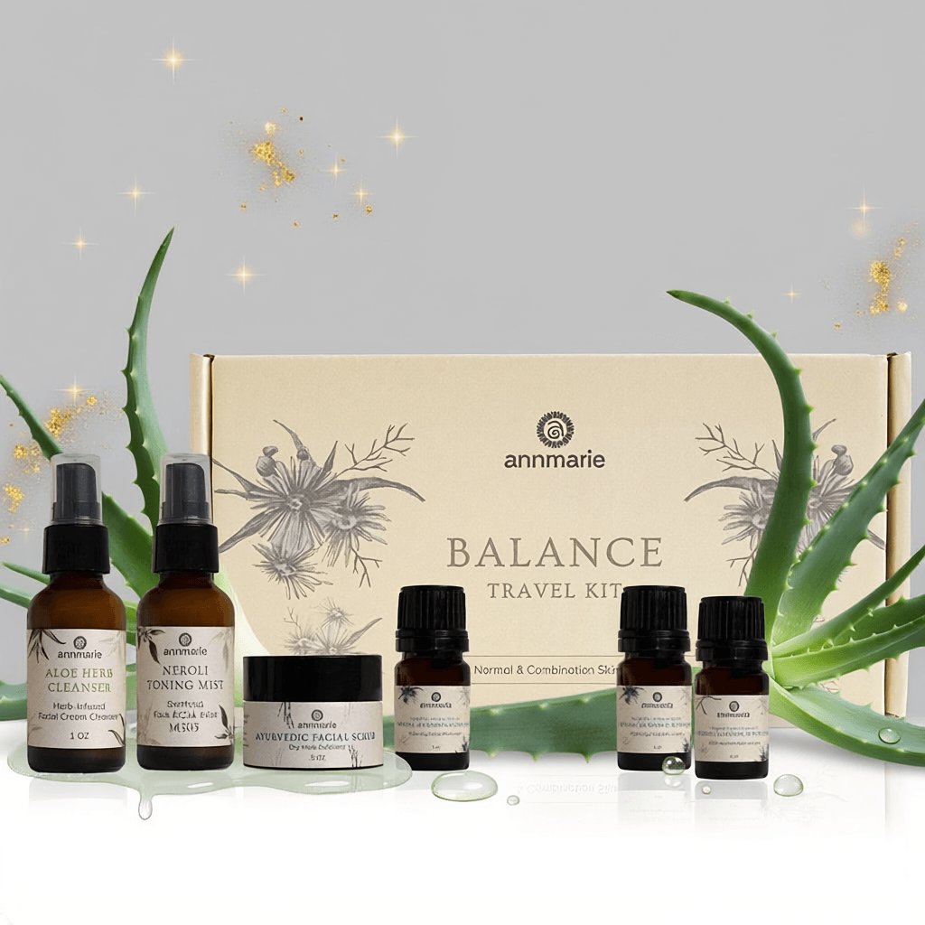 Annmarie Balance travel kit with skincare products and aloe vera plants on a light gray background.