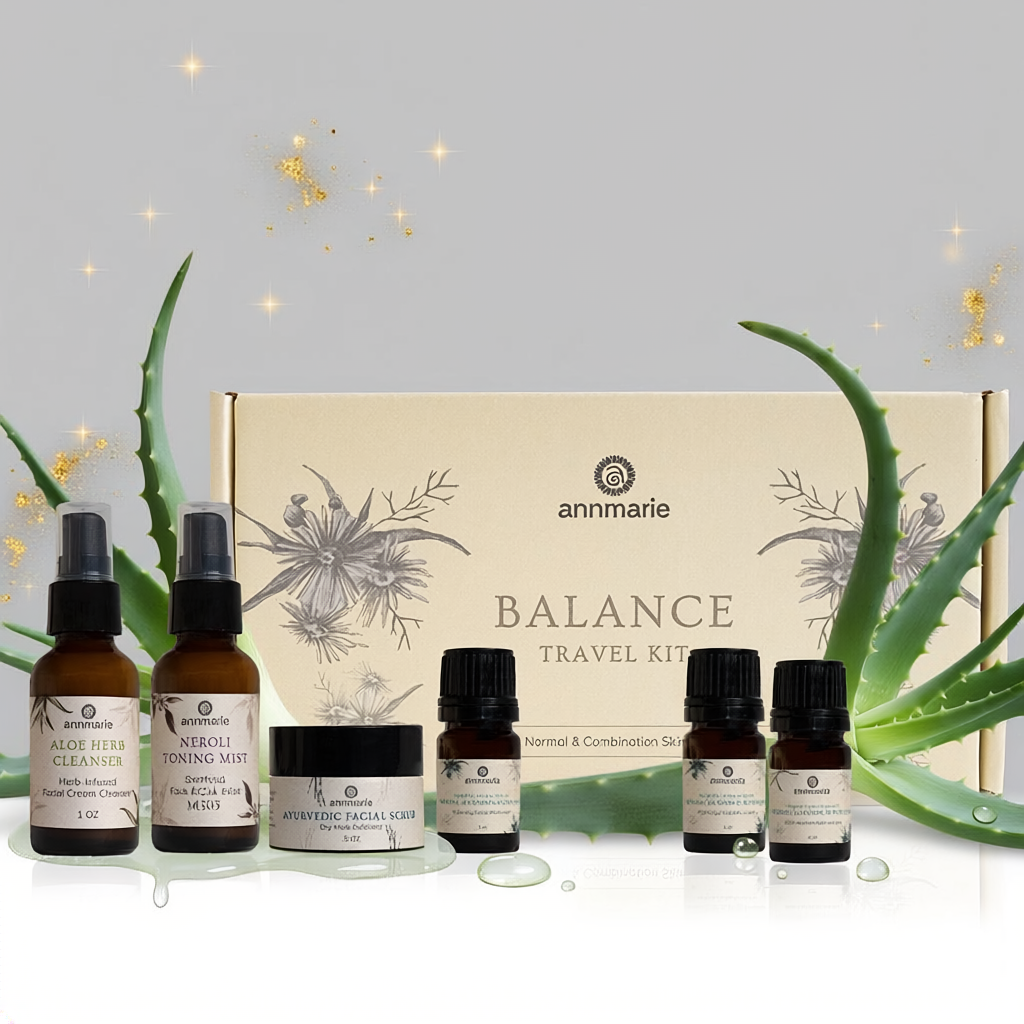 Annmarie Balance travel kit with skincare products and aloe vera plants on a light gray background.