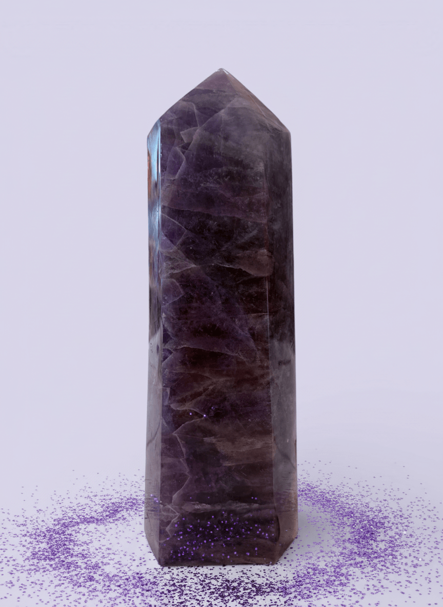 Purple crystal tower on a white background