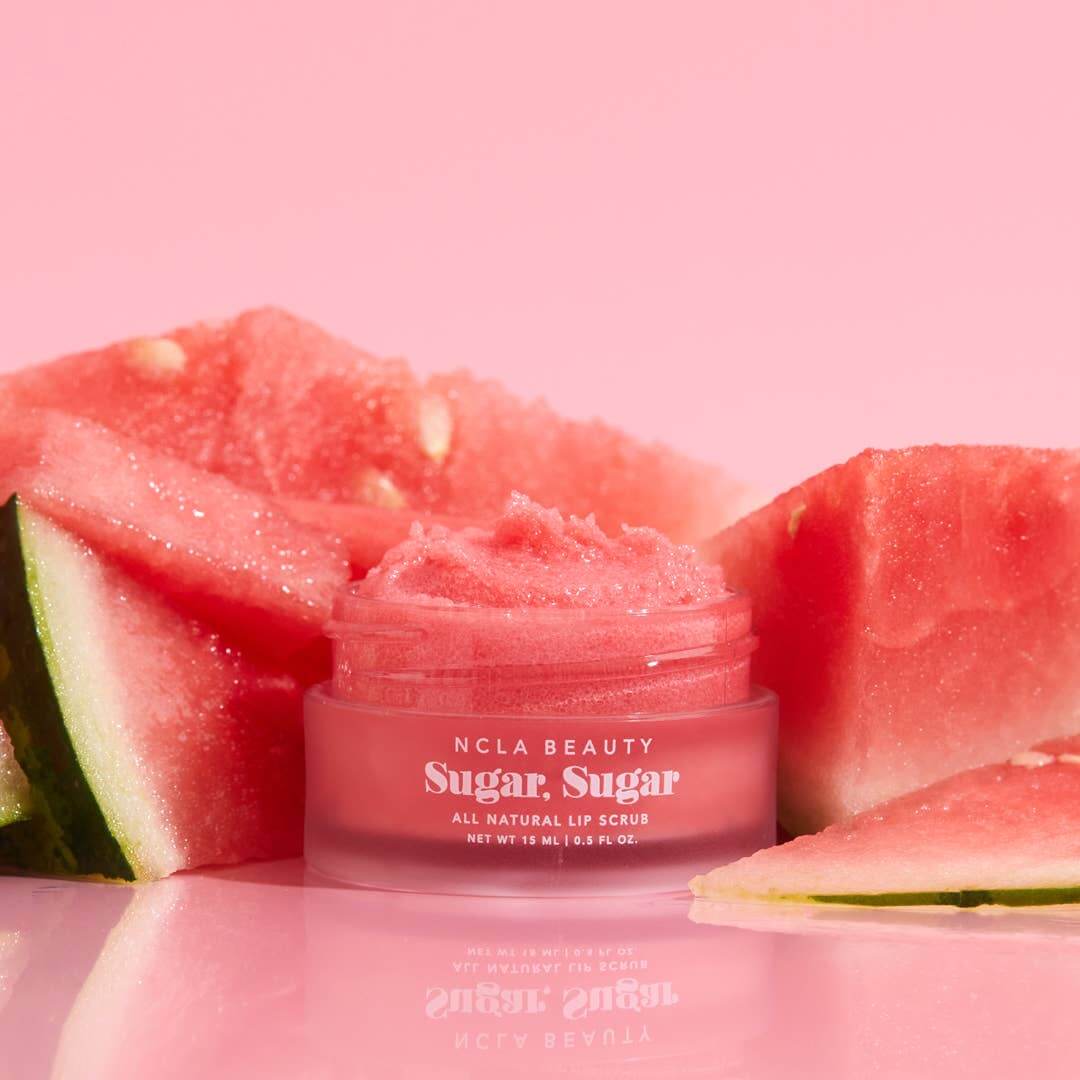 NCLA Beauty Sugar, Sugar lip scrub with watermelon slices on a pink background