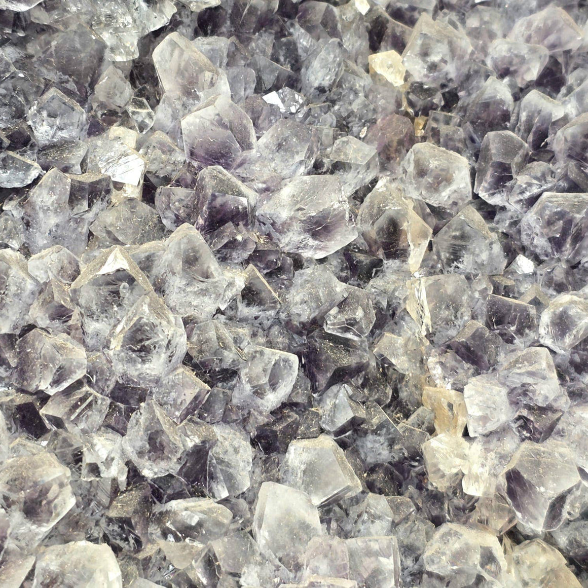 Close-up of small, clear crystal-like stones.
