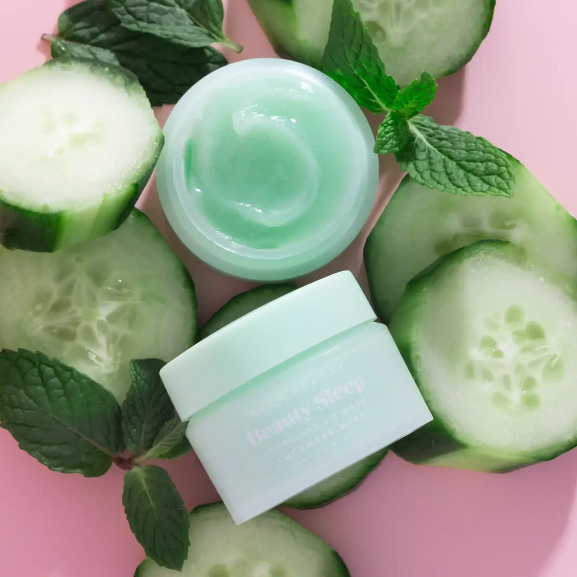 Beauty Sleep Overnight Lip Mask – Cucumber Mint with cucumber slices and mint leaves for soft hydrated lips.