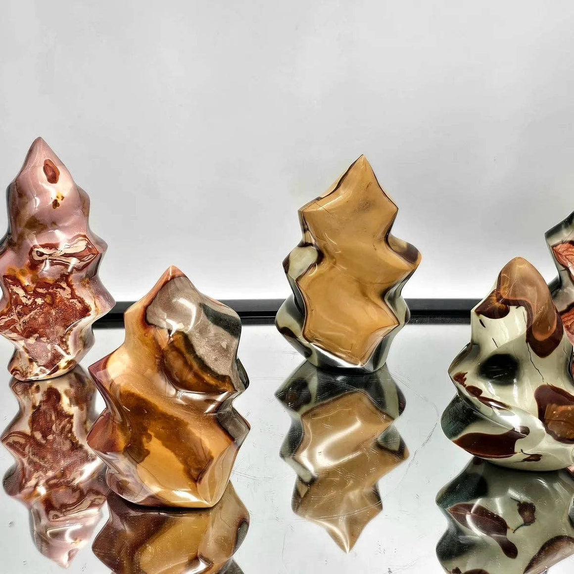 Set of metallic beads with a reflective surface on a white background