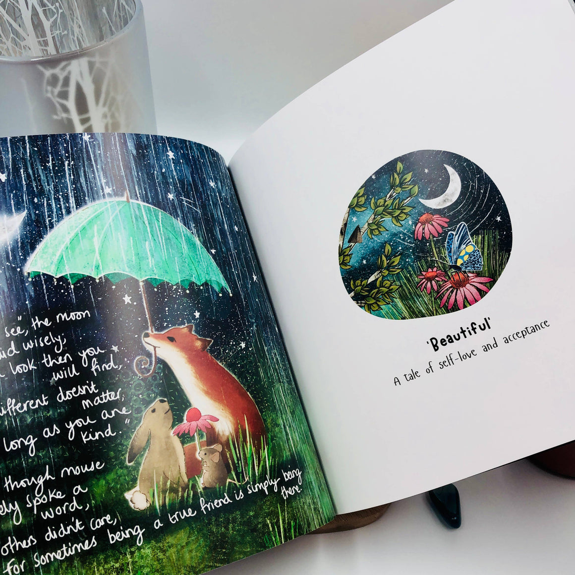 Open book with illustrations of a fox, rabbit, and butterfly under a green umbrella.