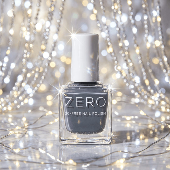 Bottle of ZERO nail polish on a glittery background